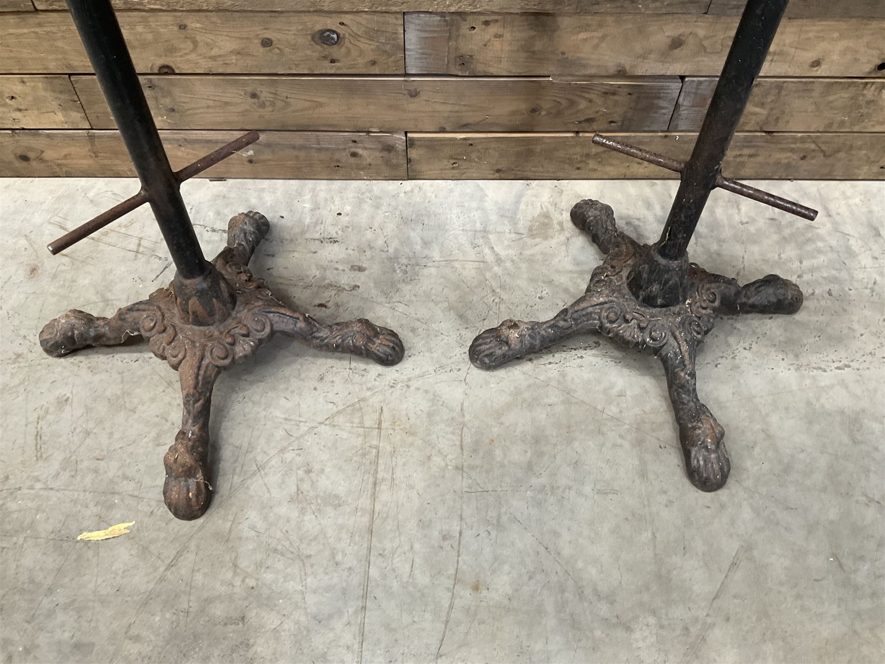 Pair of heavy cast iron tractor seat bar stools