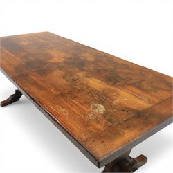 Carolean revival oak dining table and eight chairs (7+1), refectory table with rectangular boarded top and cleated ends, raised on shaped trestle end supports with central stretcher, accompanied by eight high-back chairs including a carver, leather upholstered panels and seats with studwork, on turned legs with stretchers.