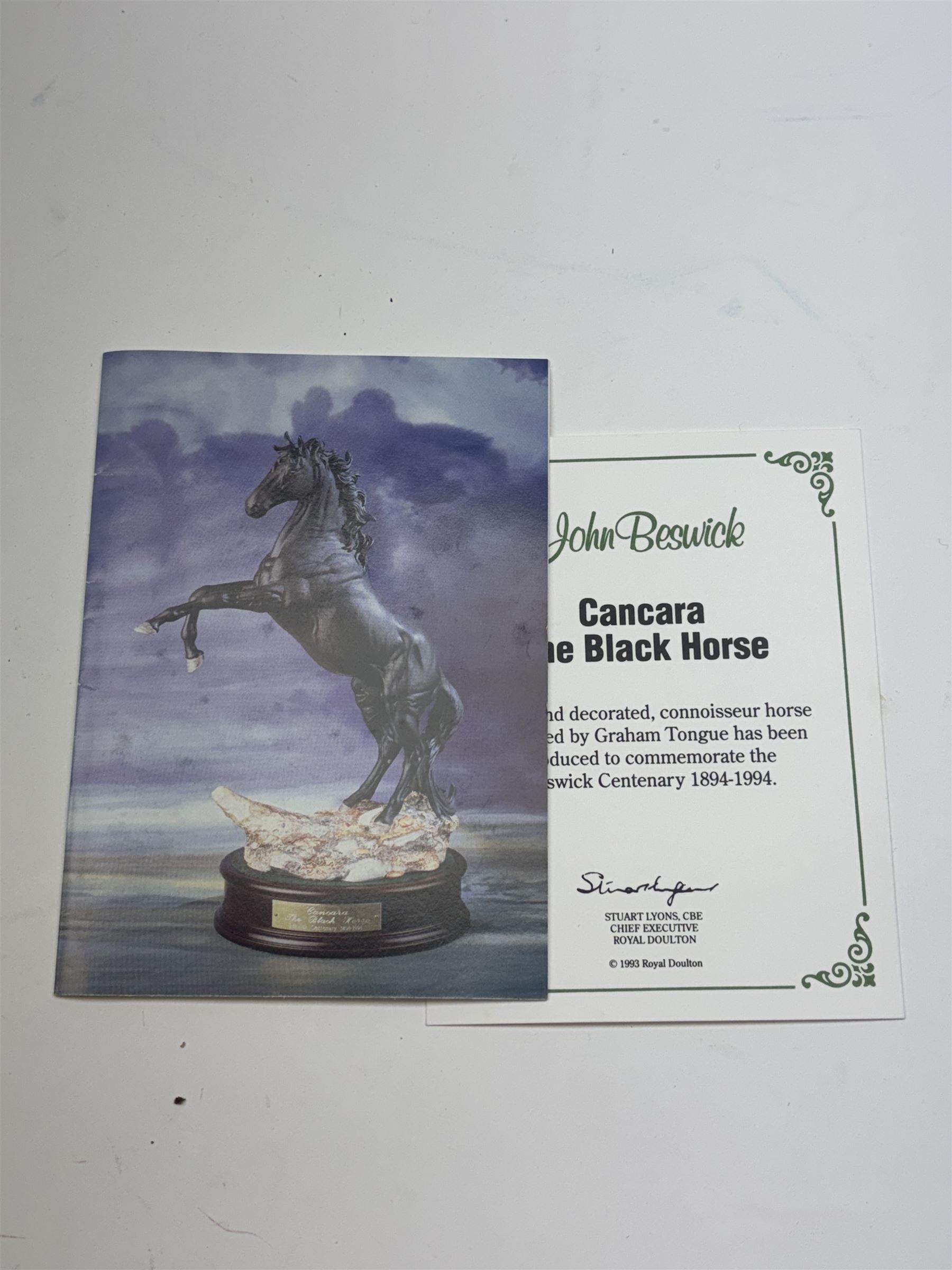 Beswick Cancara The Black Horse, designed by J. G. Tongue, modelled rearing horse on a naturalistic stony ground, upon a circular plinth with engraved title plaque, with certificate and in original box, H46cm 