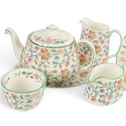 Minton Haddon Hall tea and dinner service, including teapot, milk jug, hot water jug, open sucrier, ten teacups and eight saucers, eight dinner plates, eight soup bowls, etc 