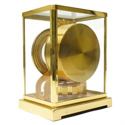 Jaeger- LeCoultre Atmos clock No.291241, with white dial in brass and five glass case and outer carrying case with instruction booklet and original receipt dated 1970 H22cm