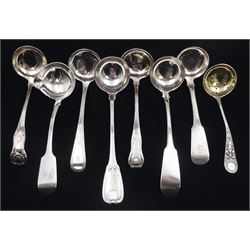Collection of eight 19th century silver ladles/sifting spoons, to include Victorian Irish silver Fiddle pattern sauce ladle, the circular rat tail bowl with lip, engraved with monogram to terminal, hallmarked John Smyth, Dublin 1851, and seven Scottish silver examples including Kings pattern ladle, hallmarked William Scott Peat, Edinburgh 1827 and a Victorian sifting spoon, with silver-gilt bowl, embossed foliate decoration and engraved initials to terminal, hallmarked Thomas Ross & Sons, Glasgow 1896