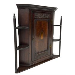 19th century oak wall hanging corner cupboard, single panelled cupboard with shell motif, three shelves to either side