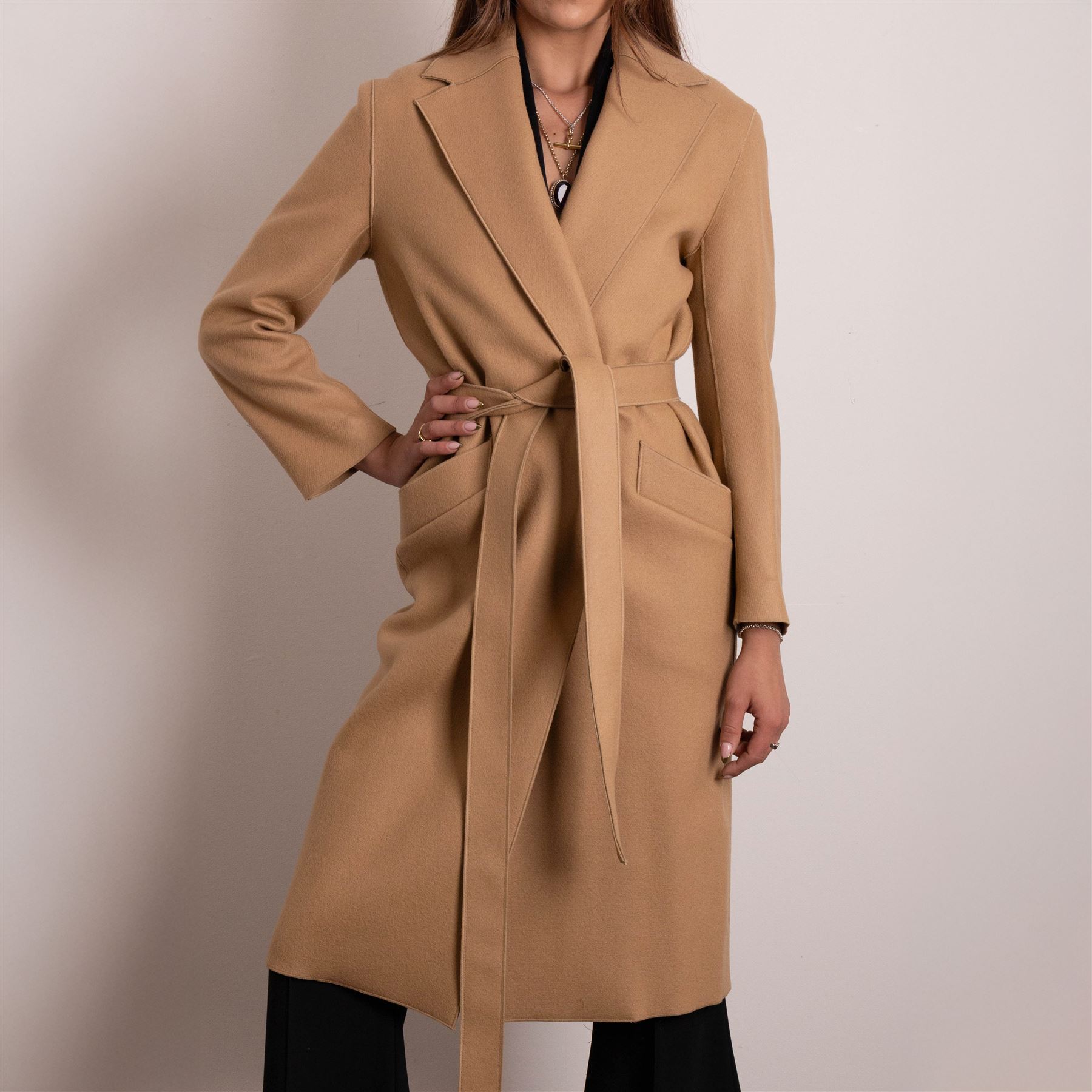 Amanda Wakeley London - full-length coat in camel wool, with notched lapels, concealed front fastening, self-tie belt, and side slip pockets, of minimalist tailored form, from the 'Petite Chic' line, unused