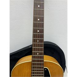 1950s acoustic guitar with f-holes and pickguard L105cm; black fur lined hard carrying case