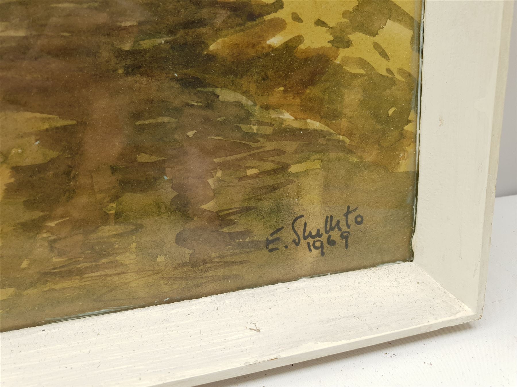 E Greig Hall (British 20th century): 'Striding Edge Helvellyn', watercolour signed, titled and dated '73 verso; 'Summer in Wharfedale' and Yorkshire Landscape, two watercolours signed E Shillito, max 49cm x 37cm (3)