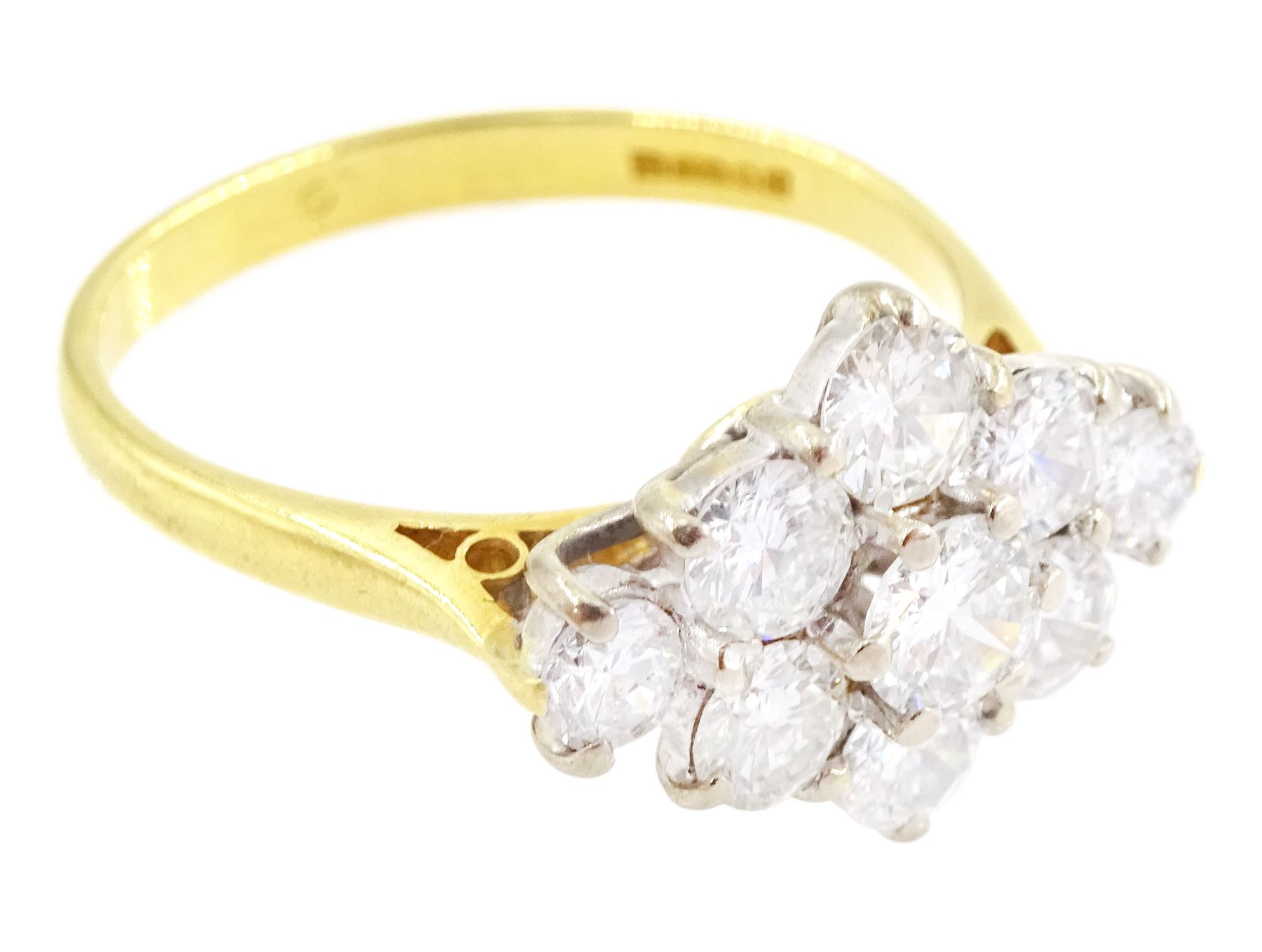 18ct gold diamond cluster ring, nine round brilliant cut diamonds, in a marquise shaped setting, London 1988, total diamond weight approx 1.65 carat