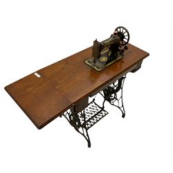 Singer - walnut and cast iron treadle sewing machine