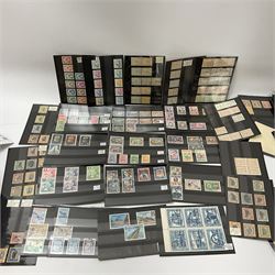 Mint and used stamps on stockcards, many being from Guatemala, including  various 1878 values, 1929 'Oficial' triangle stamps,1933 values to one Centavos, 'Aereo Exterior 1934' overprints, various other overprints, postal stationary etc, housed in four small boxes