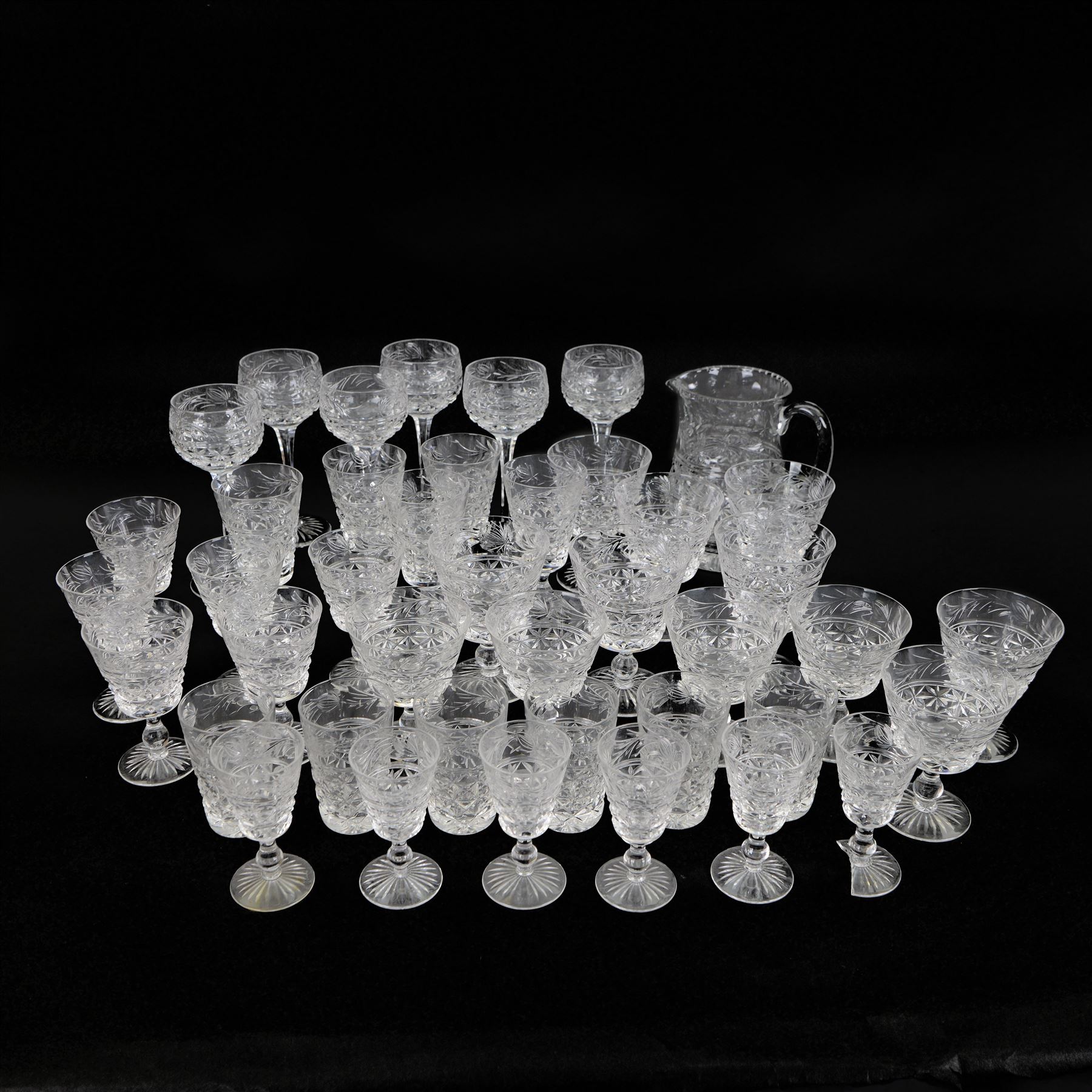 Stuart Crystal Mansfield pattern drinking glasses, including hock glasses, sherry glasses and wine glasses, together with a matching water jug (42)
