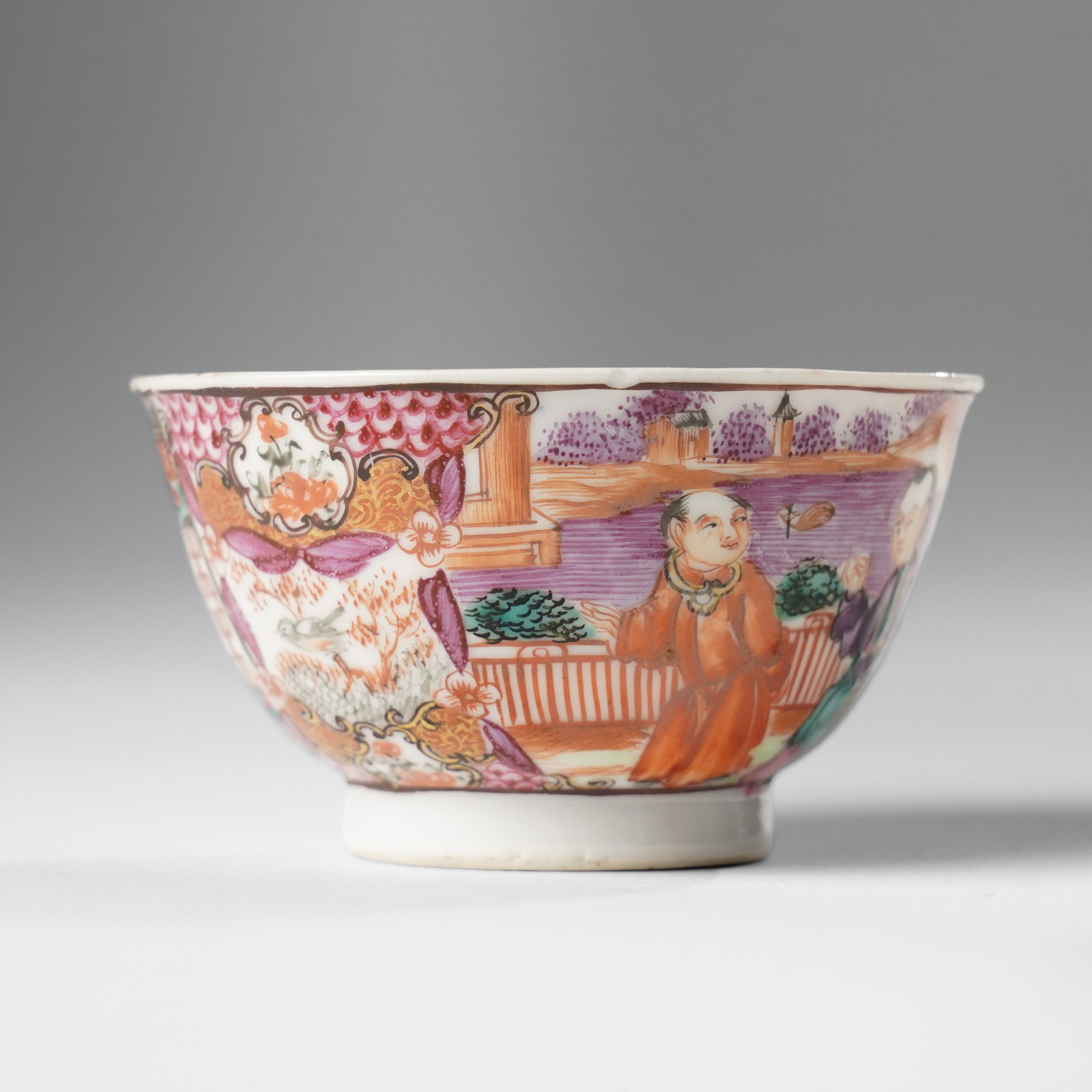 Two pairs of 18th/19th century Chinese export tea bowls and saucers, the first decorated in the 'Mandarin Palette' in typical colourways, the other famille rose examples painted with figures near a window, all unmarked (4)