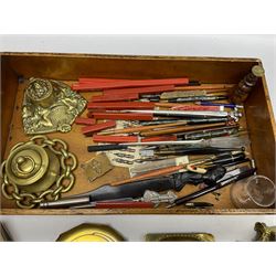 Collection of writing accessories, comprising five brass inkwells of various form, brass moulted blotter, treen stamp, brass stamp box, various pens, letter openers, red wax blocks, in one tray