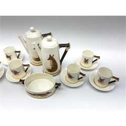 A Royal Doulton Reynard the Fox pattern coffee set, comprising two coffee pots, open sucrier, six coffee cans and six saucers, decorated in low relief with foxes, with printed marks beneath. 