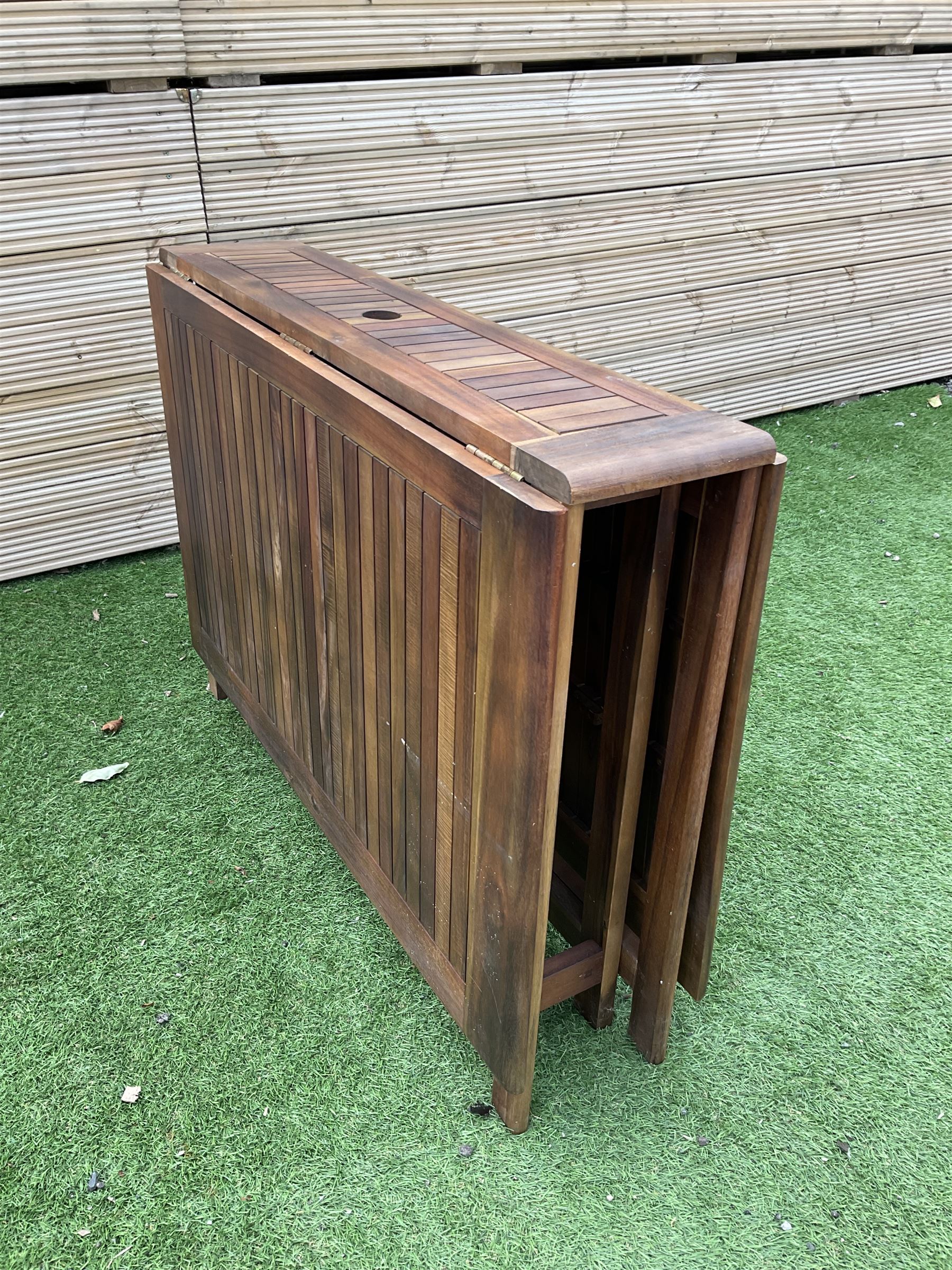 Winchester Collection - 20th century teak garden table drop-leaf table and set four matching folding chairs - THIS LOT IS TO BE COLLECTED BY APPOINTMENT FROM DUGGLEBY STORAGE, GREAT HILL, EASTFIELD, SCARBOROUGH, YO11 3TX