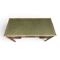 Military campaign style mahogany writing desk, inset gilt-tooled green leather writing surface, fitted with five drawers with recessed brass handles, brass corner mounts and protective bindings, on square tapering legs