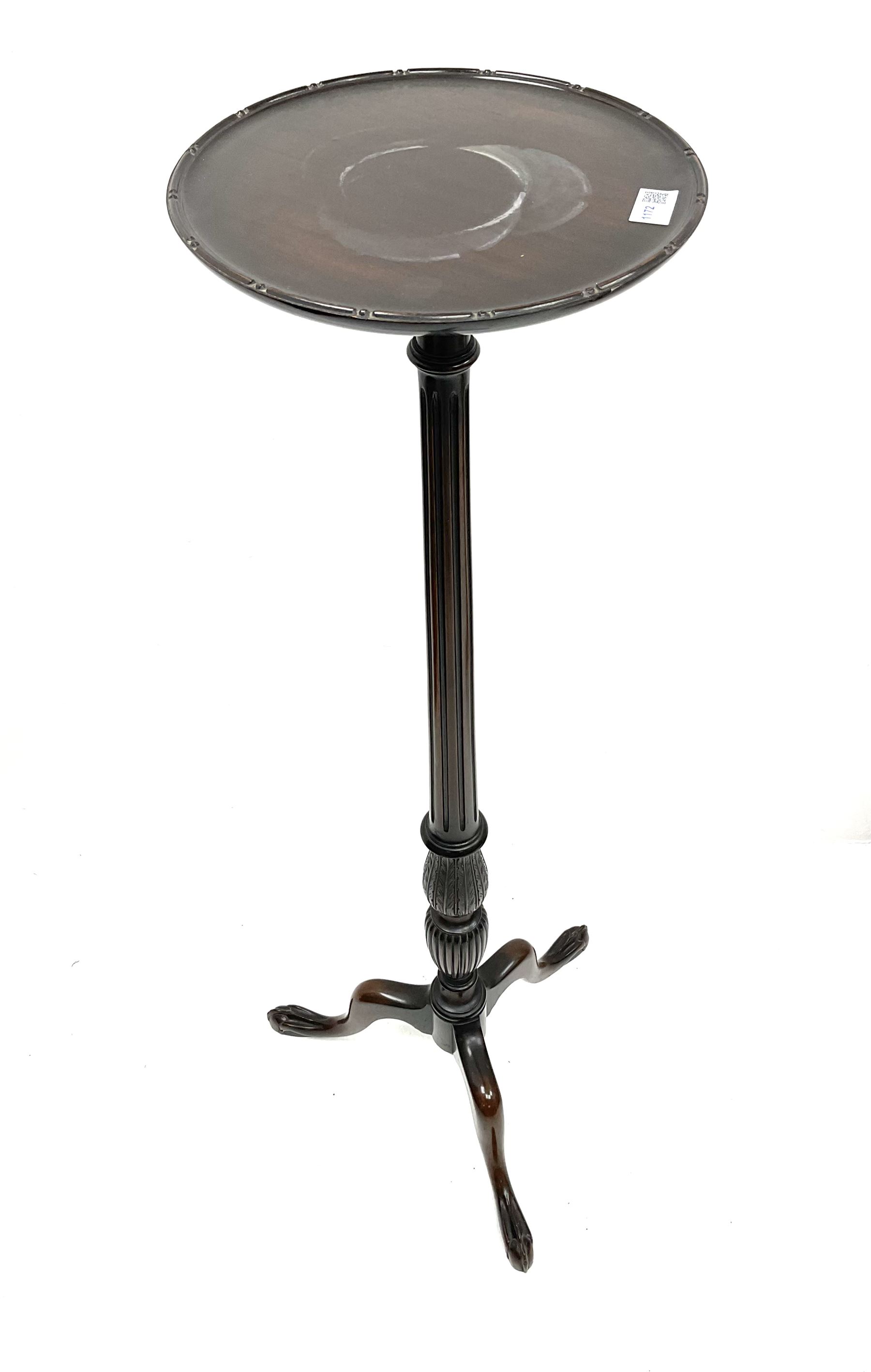Early 20th century mahogany plant stand, carved central column, raised on three cabriole supports 