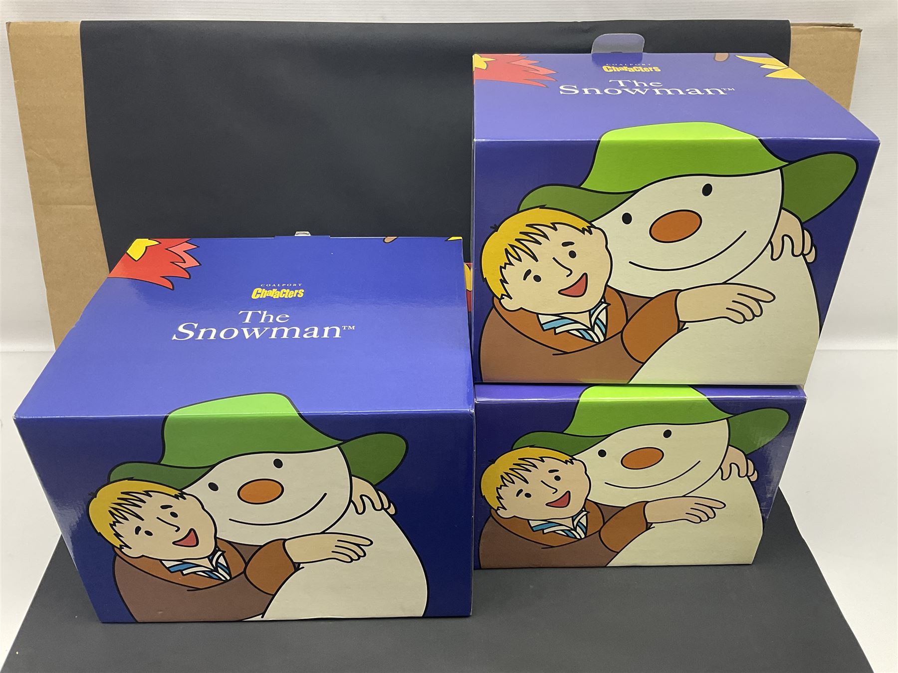 Three Coalport Characters The Snowman figures, comprising Dinner for Two, Off Piste and Winter Fun, all with certificates and original boxes 