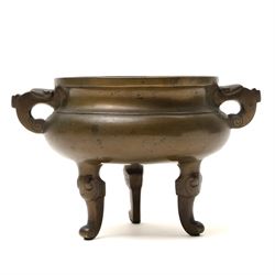 19th century Chinese bronze censer with loop handles and on shaped supports D13cm and an Asian bronze bell H17cm