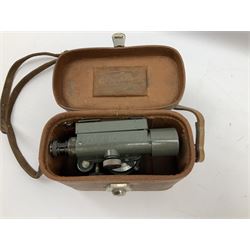 Black finished monocular microscope by Prior London No. 17372,  with pitchfork base and rack and pinion focusing, in original fitted wooden case with additional lenses, H32cm, together with Watts dumpy level, no. 116249, in a leather case