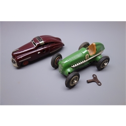  Two Schuco clockwork tin-plate cars - Schuco Fex 1111 in maroon with 'cranking handle' key L15cm and Studio 1050 Mercedes Benz racing car with key, made in US Zone, both unboxed (2)  
