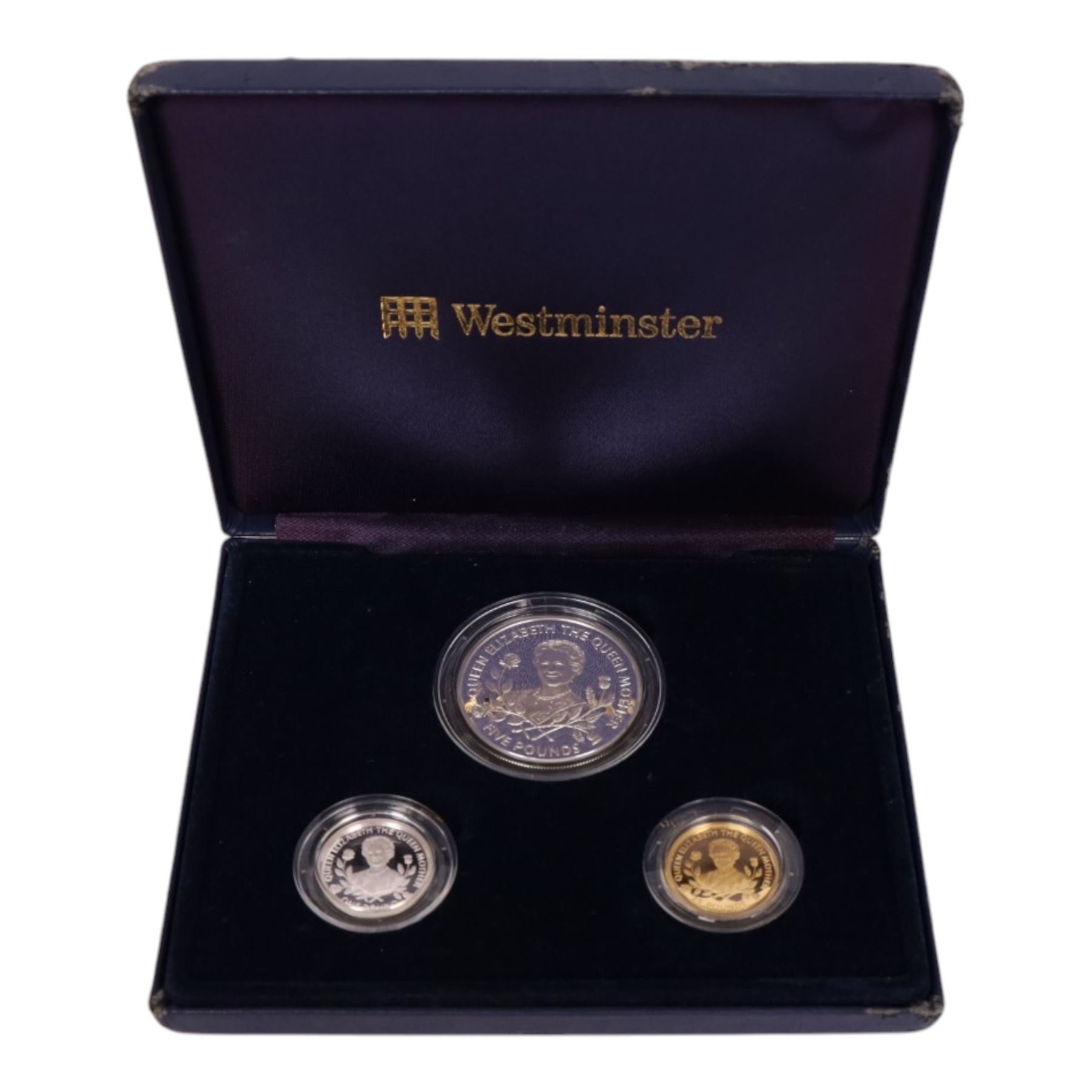 The Royal Mint Guernsey 1995 'Queen Elizabeth The Queen Mother 95th Birthday Family Set', comprising gold proof twenty five pound coin, silver proof five pound, and silver proof one pound, cased with certificate