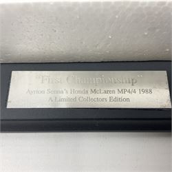 Ayrton Senna Racing Car Collection - McLaren MP4/4 1988 World Champion; boxed; with separate stand titled 'First Championship'