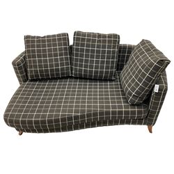 Shaped chaise sofa with curved back support, upholstered in dark grey chequered fabric, with cushions, on light wood splayed front feet