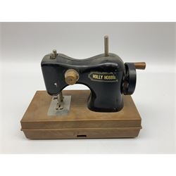 Singer mini sewing machine, together with Holly hobbie mini sewing machine and other sewing machine models, Singer H15cm