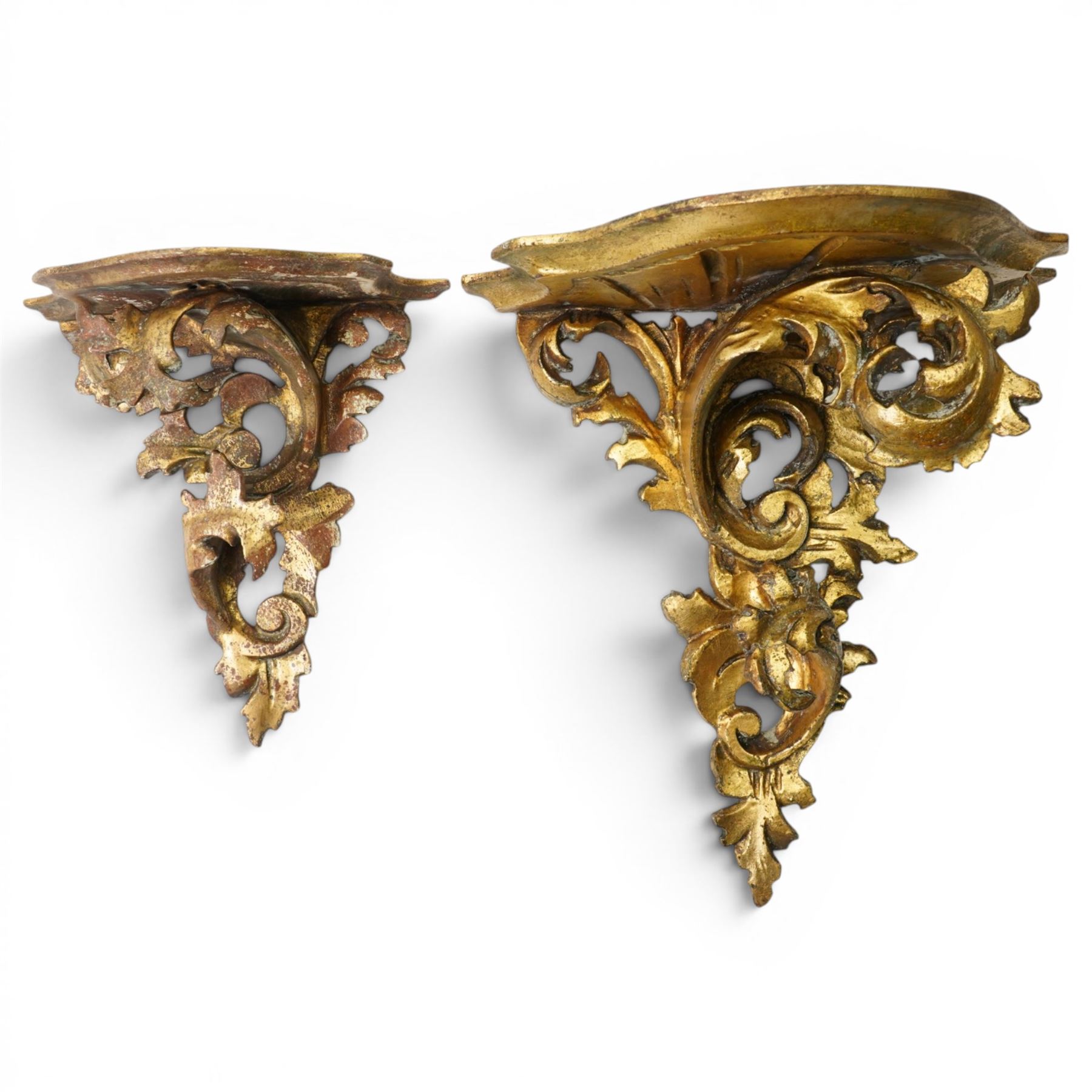   Giltwood and gesso wall bracket of leaf design with serpentine shelf W31cm and a smaller similar bracket W22cm (2)