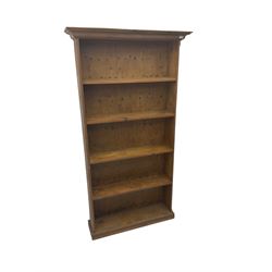 Traditional stained pine 7’ open bookcase, projecting cornice over four shelves