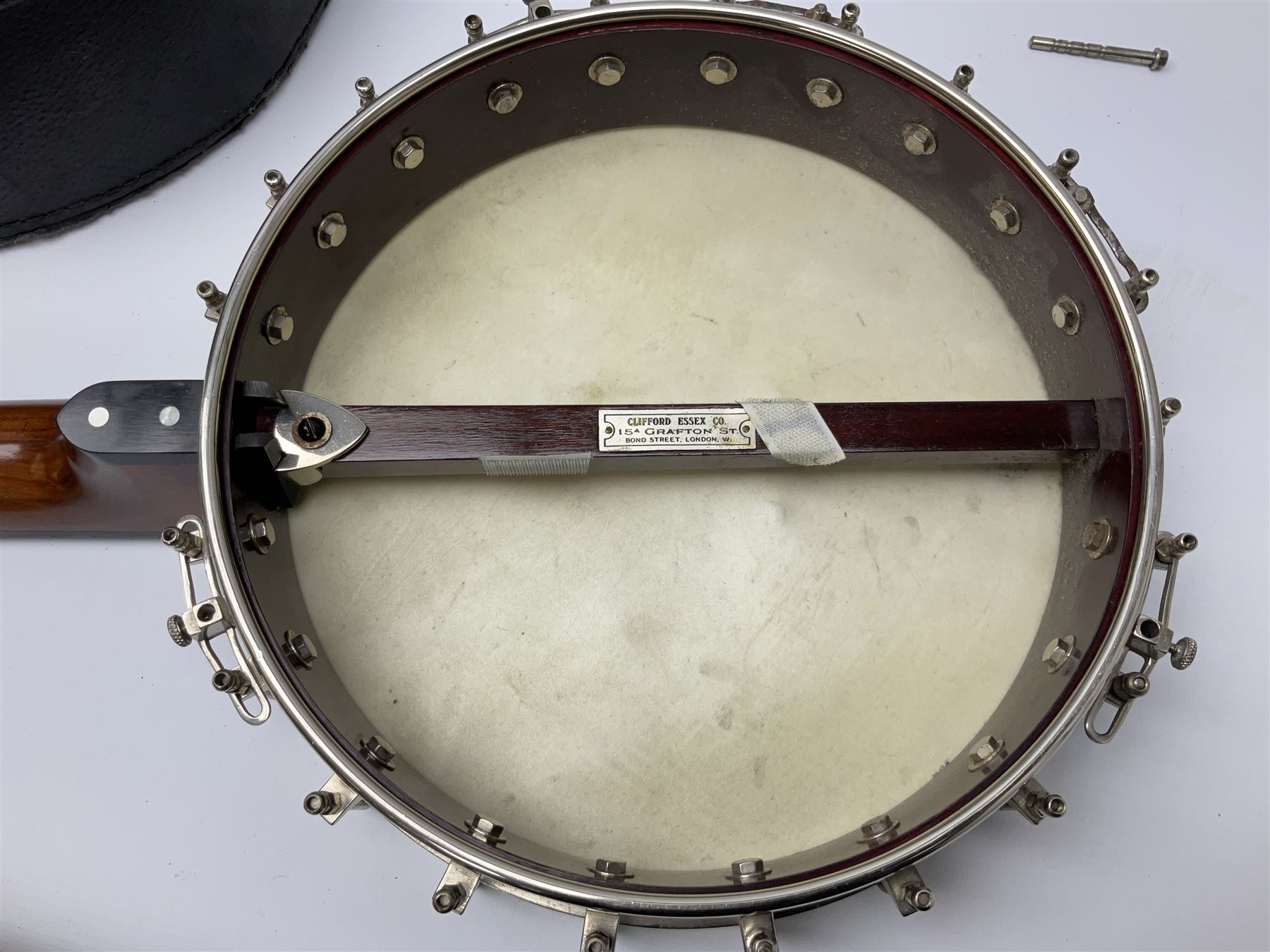 Five-string banjo by Clifford Essex Co. 15A Grafton Street, Bond Street, London W, with mother-of-pearl inlaid ebony fingerboard L92cm; in carrying case with strap