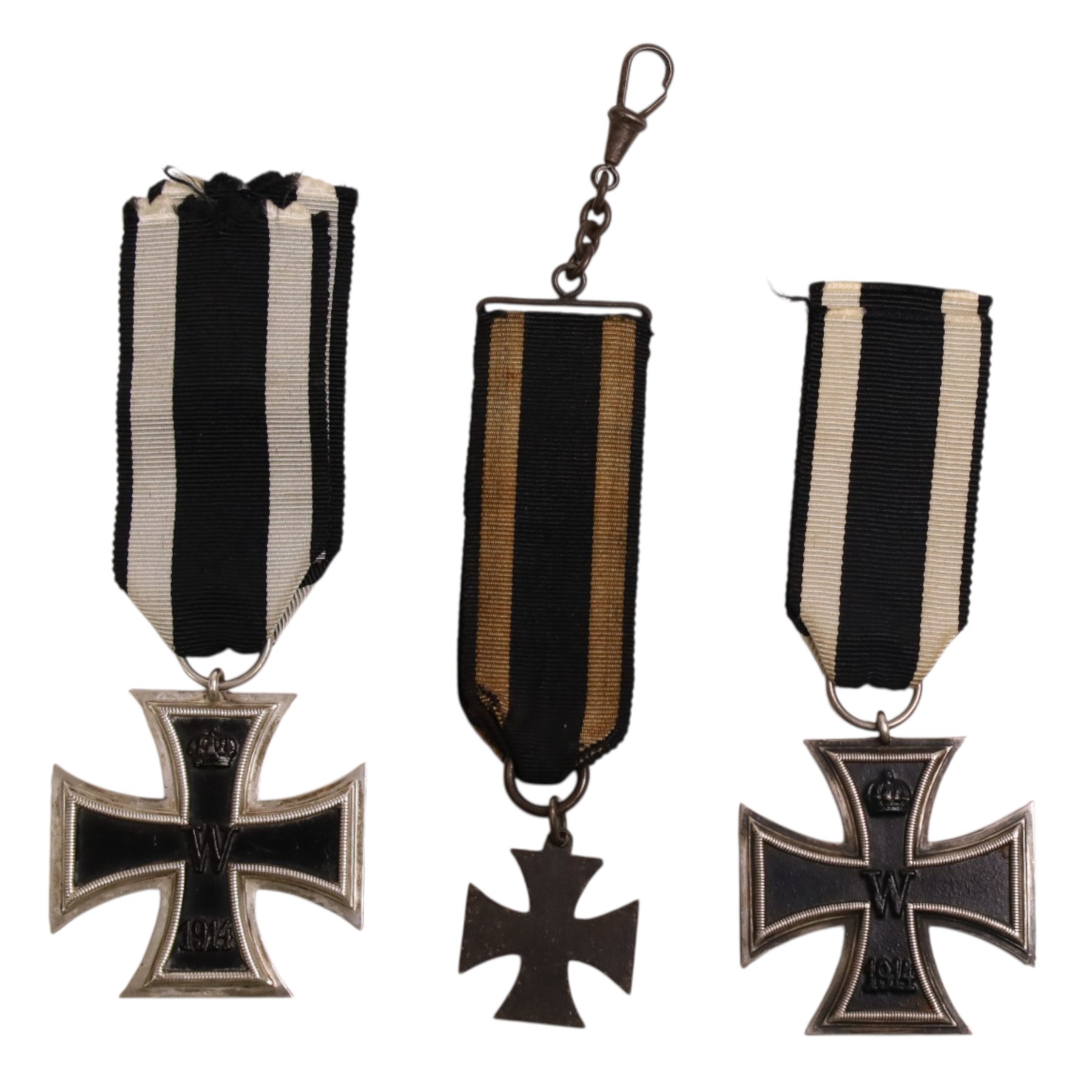  WWI German two Iron Crosses 1st class, together with a Iron Cross watch fob 
