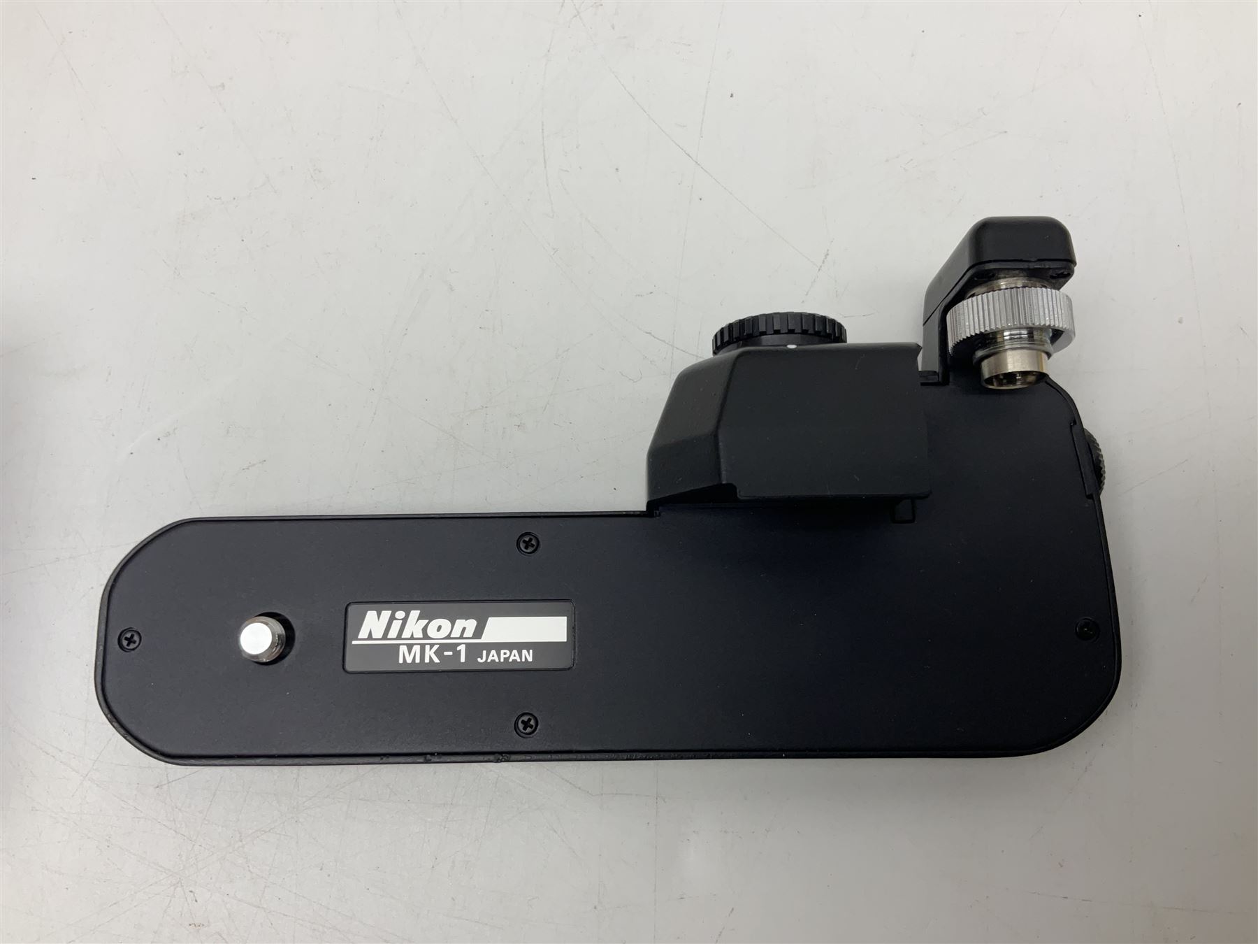 Nikon F3T camera body, in champagne/ titanium colourway, serial no. T8215031, with 'Nikon Nikkor 50mm 1:1.4' lens, Nikon MD4 motor drive, serial no. 156592 and Nikon MK-1 Firing range converter, all with original boxes 