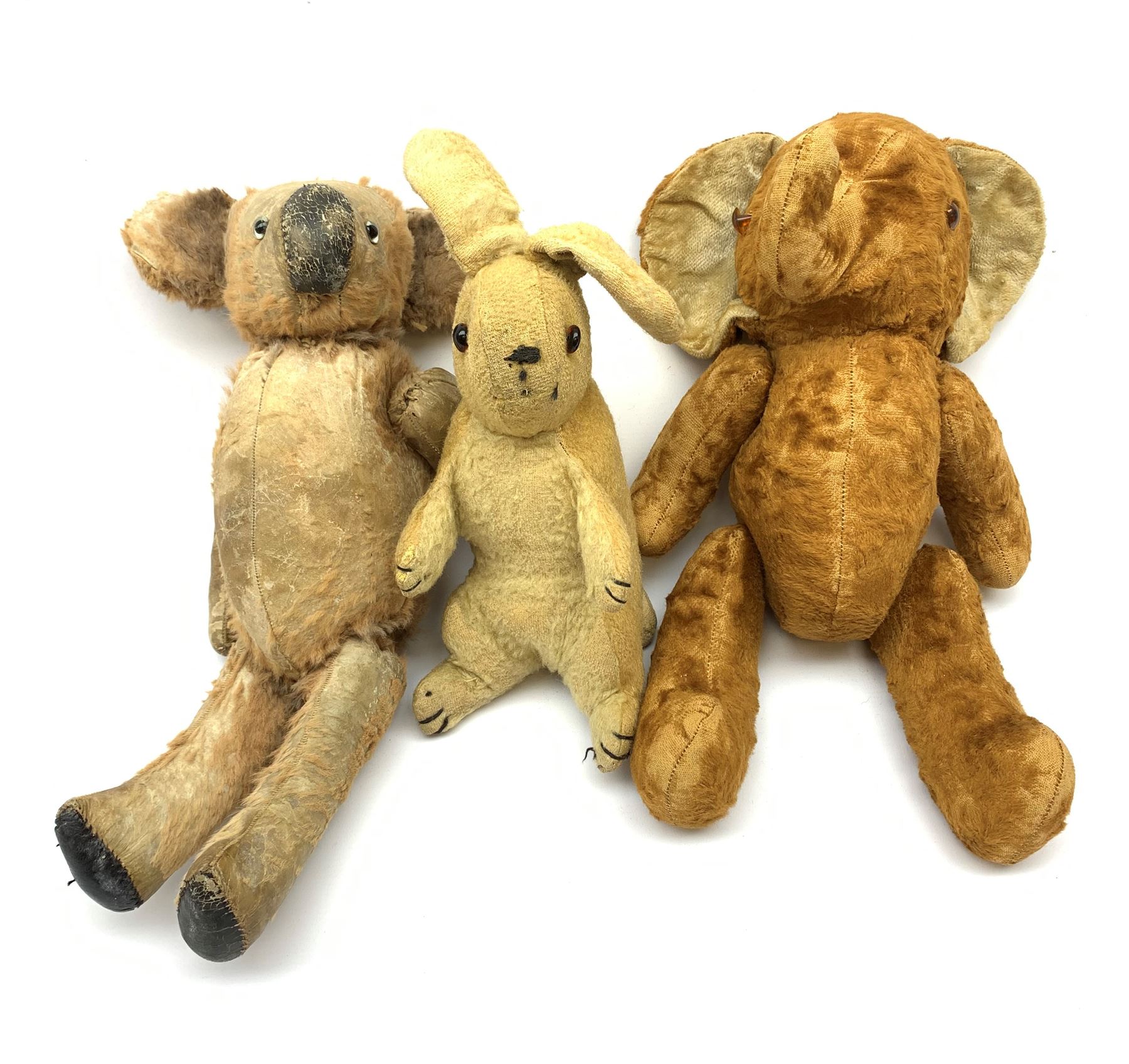 Three 1950s animals comprising unusual hide koala bear with traces of original fur, swivel jointed head, glass eyes and jointed limbs H16