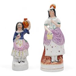 Victorian and later Staffordshire flatbacks, spill vases and figures including 'Gipsy Boy', two modelled as 'Marquess of Lorne and Princess Louise', 'Uncle Tom & Eva', 'Paul & Virginia' and other models, H33cm max (12)