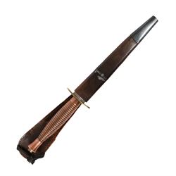 British Commando knife, with 17.5cm double edged blade, with leather scabbard, overall L31cm