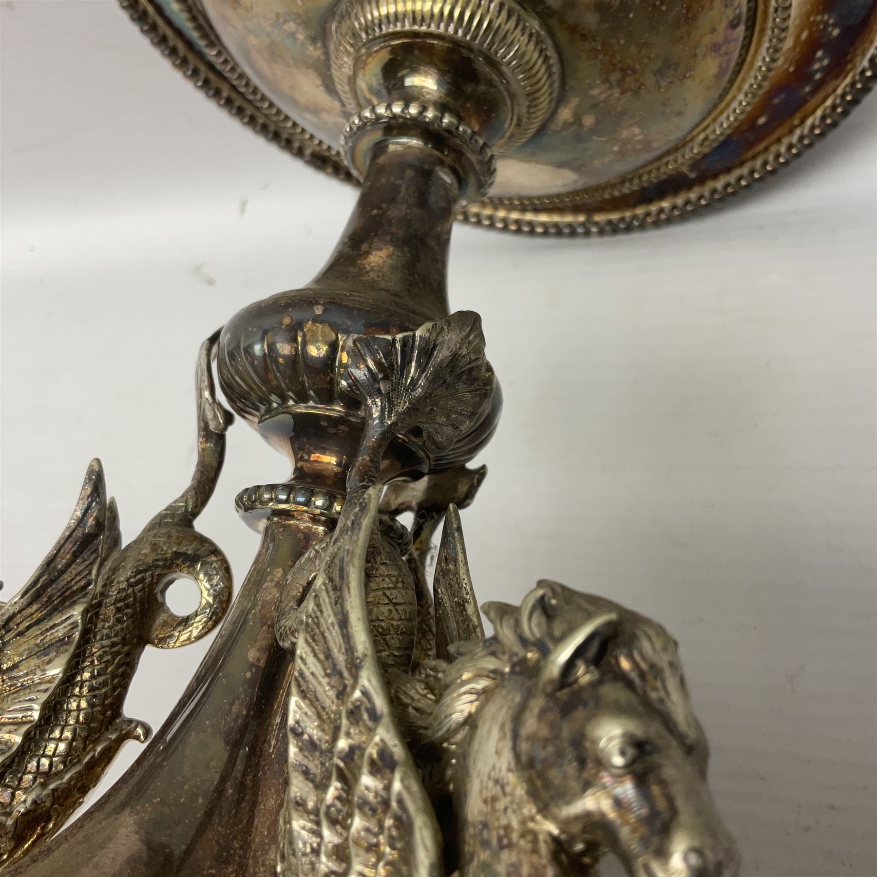 Silver plated centrepiece, with a triform base formed as three Hippocampus with beaded detail, numbered 3682 to the base, H18cm 
