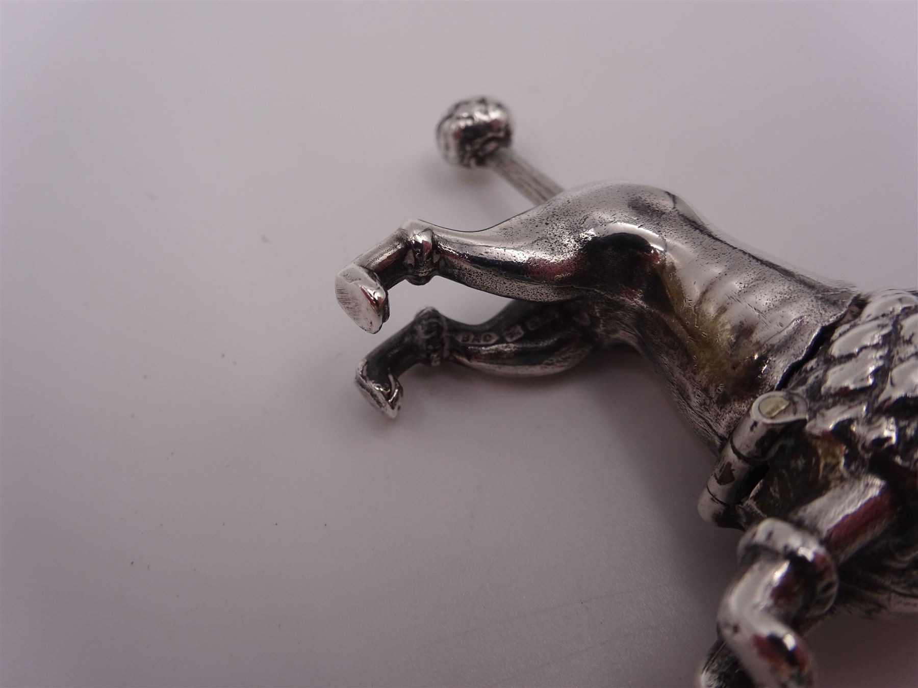 Modern silver novelty cigar cutter, modelled as a poodle, hallmarked, H4cm