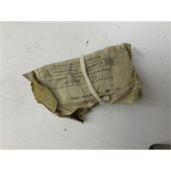 WW2 German 'SS' leather belt with six pouches (one containing unused field bandage) and buckle inscribed 'Meine Ehre Heifst Treue'; belt marked 0/0836 0029