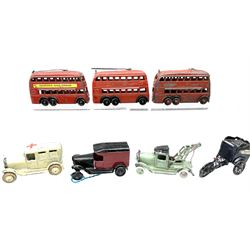 Taylor & Barrett - seven unboxed and playworn pre-war and early post-war die-cast models comprising ambulance; breakdown lorry; Ice Brick vendors cycle cart; open back van; and three Trolley buses (7)