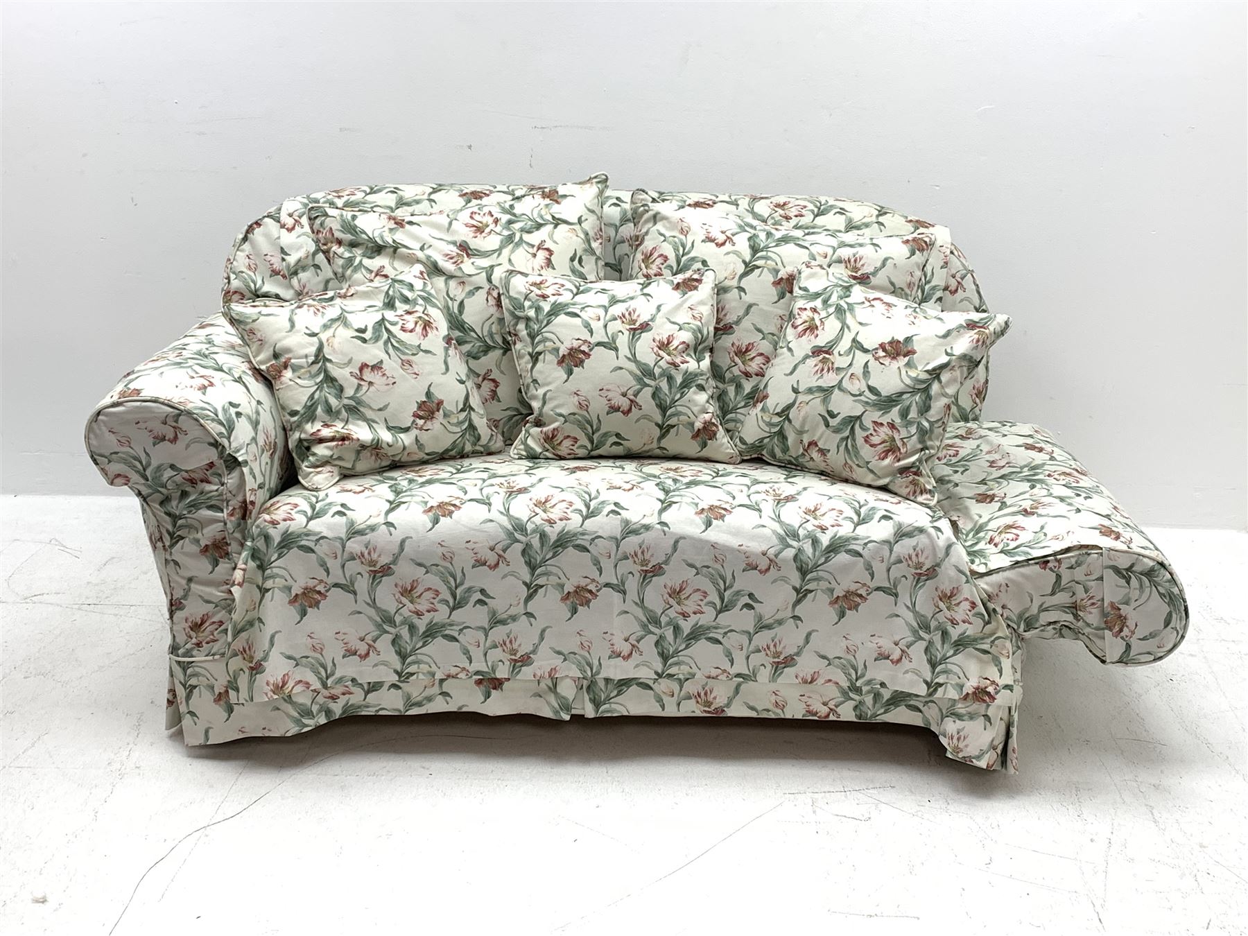 Early 20th century two seat settee with drop arm, upholstered in Sanderson 'Absalon Minor' fabric, loose covers and cushions, white ground with overall floral design
