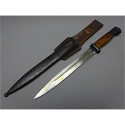  German Bayonet, 25cm blued steel single edge fullered blade with ricasso stamped Coppel GmbH, 7807 over f, wooden slab grip, L38cm, in metal scabbard No.5295, with leather Frog stamped F.Franek D.Berkovice,   