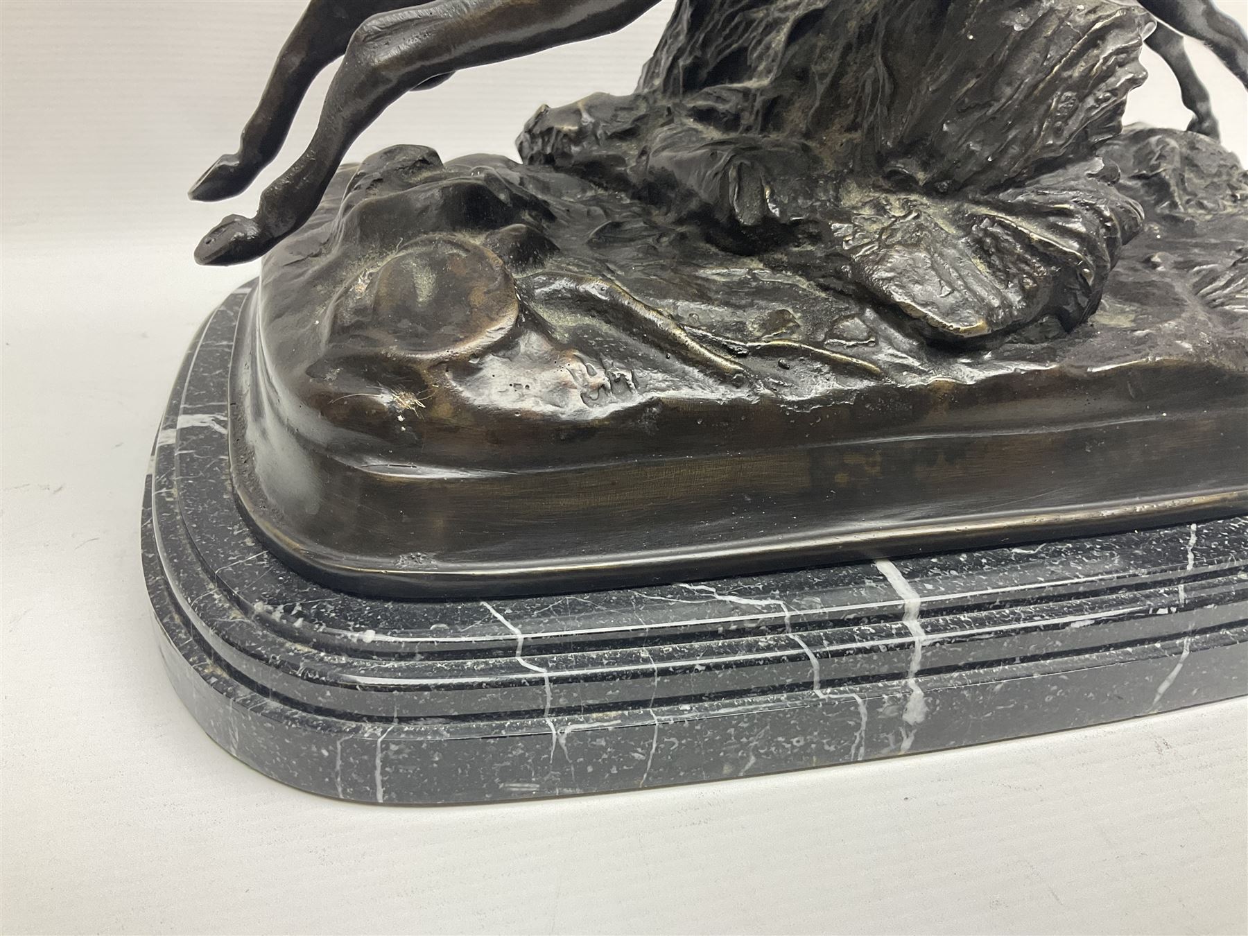 After E Loiscay, bronzed figure group, modelled as two race horses, signed E Loiscay, upon a stepped marble plinth, overall H28cm