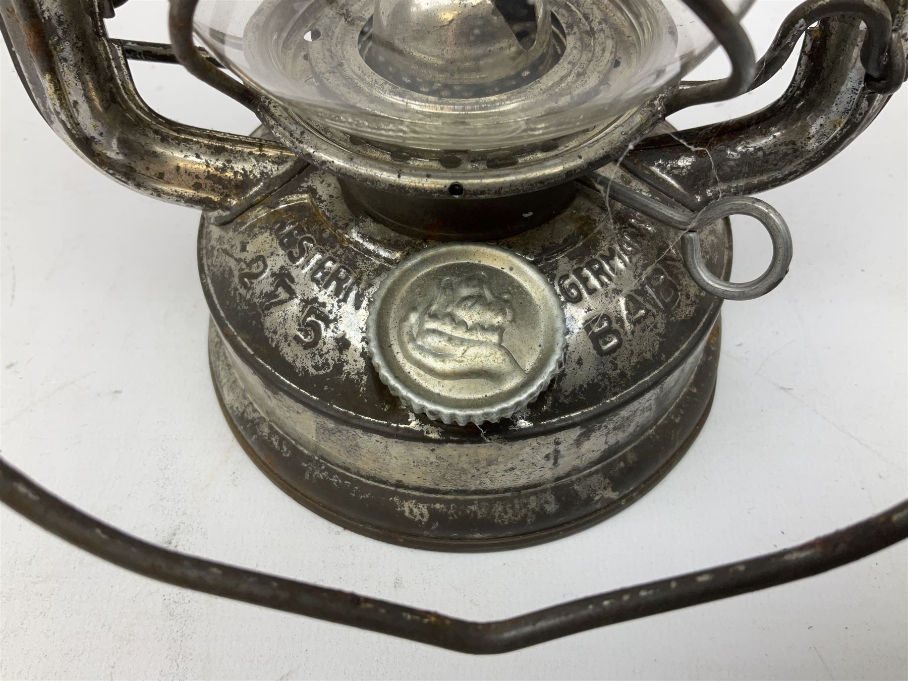 Copper and brass ship’s lamp marked ‘Anchor’, H25cm, Feuer hand storm lantern, Bialaddin Model 315 paraffin lamp and an Anchor lamp (4)