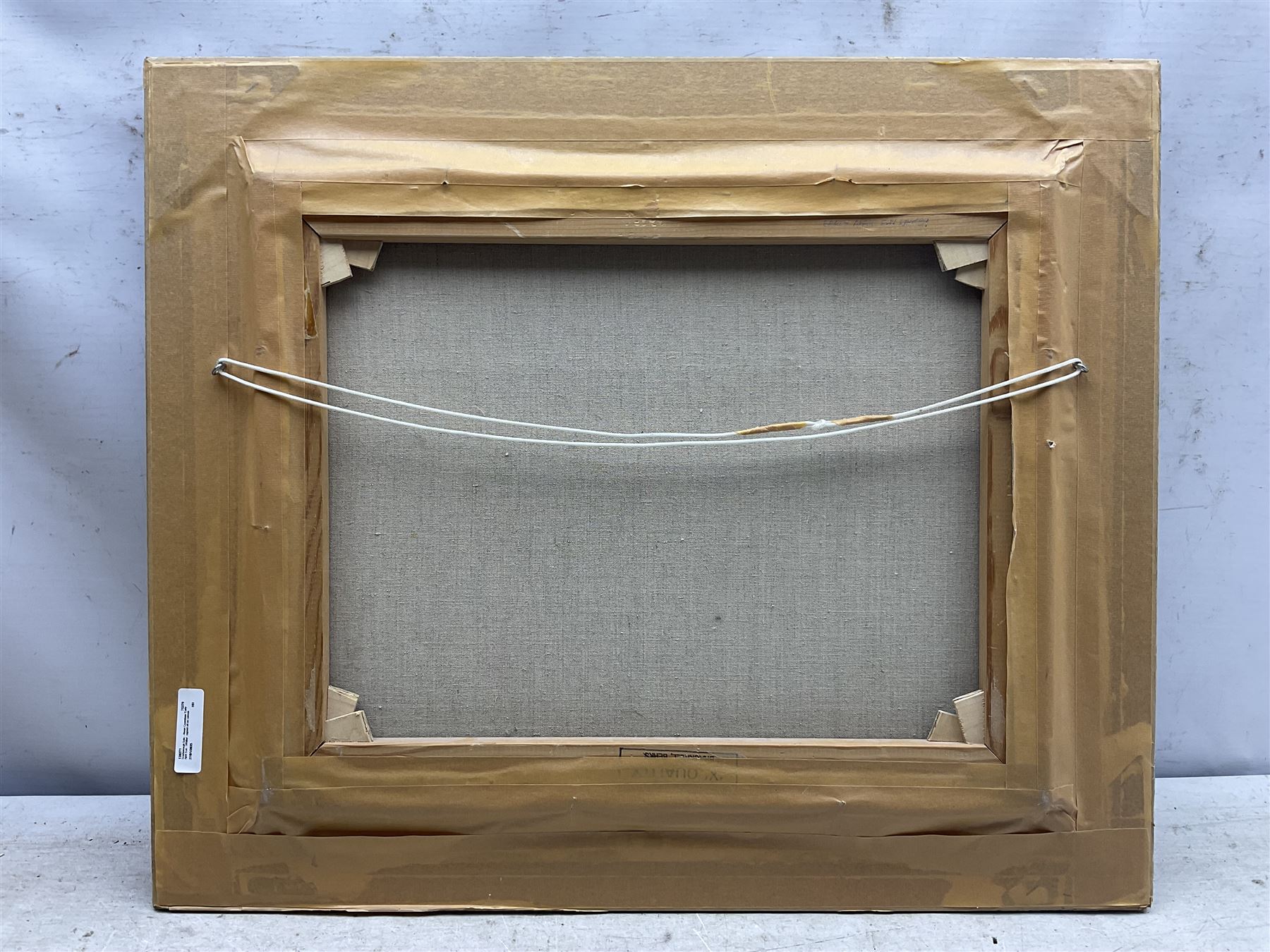 Alwyn Crawshaw (British 1934-): 'Early April Sun - Whitby' - View from the Abbey looking down onto South Bay, oil on canvas signed, inscribed verso 40cm x 50cm