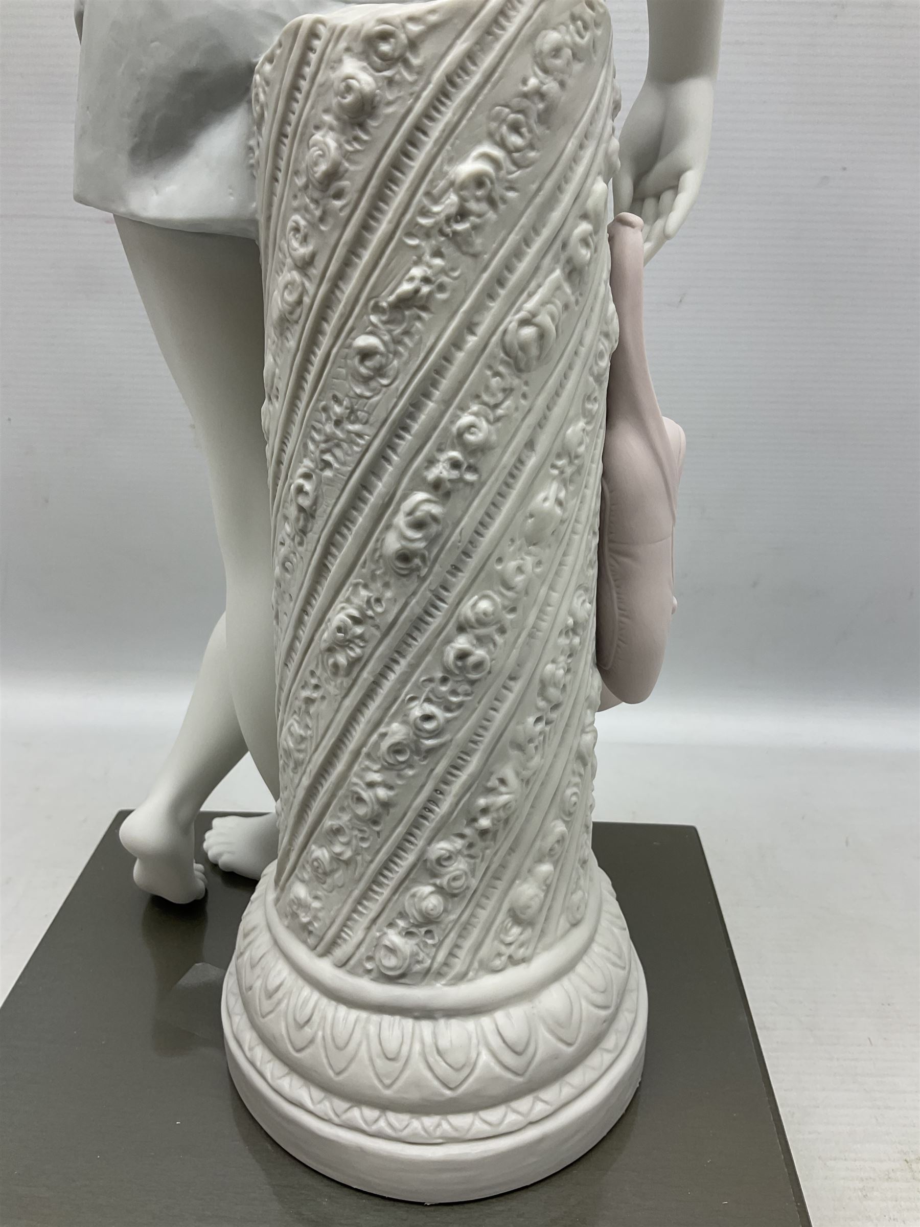 Lladro Privilege figure, Dreams of a Ballerina, modelled as a ballerina leaning against a pillar holding her ballet shoes, limited edition 396/1000, sculpted by Jose Puche, no 1889, with original box, year issued 2003, yea retired 2004, H52cm 