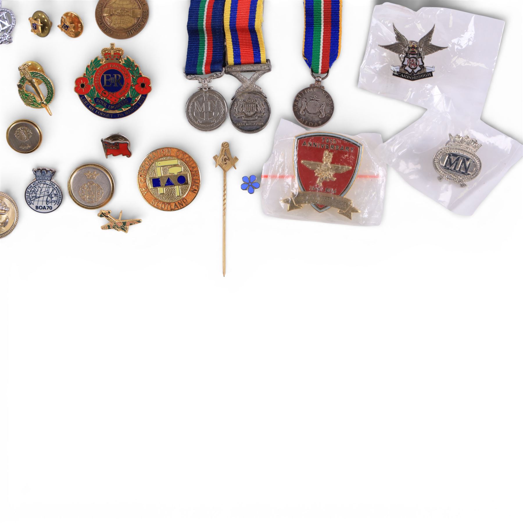 Two silver Merchant Navy service medals, both hallmarked, five other medals including miniatures and a collection of enamel pin badges