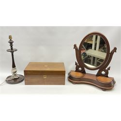 A late Victorian walnut desk slope, with brass escutcheon and vacant brass cartouche to the hinged opening cover, H16cm L40cm D24cm, together with a mahogany dressing table mirror, H52.5cm, and a stained mahogany table lamp, H47cm. (3). 