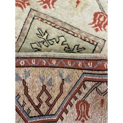 Two pale ground Turkish rugs 