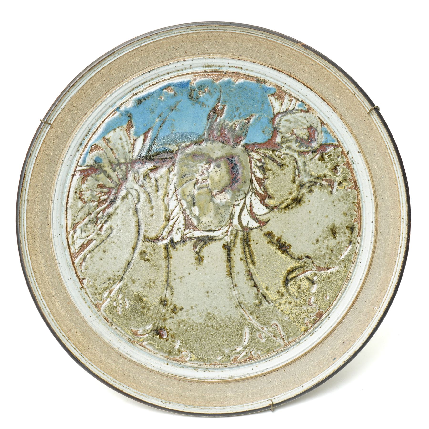 Mick Arnup (British 1925-2008): stoneware wall charger, decorated in mottled glaze with abstract decoration, incised signature to base, D45cm